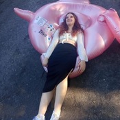 Lera and zuzana inflating and shooting with flamingo