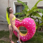 Lera shooting with inflatables and yellow bikini.