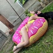 Lera shooting with inflatables and yellow bikini.