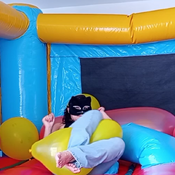 Balloons pop in the inflatable castle by Alice!!!