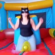 Balloons pop in the inflatable castle by Alice!!!