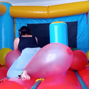 Balloons pop in the inflatable castle by Alice!!!