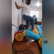 Hard jump in the inflatable bounce house by Ary!!!