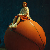 Pack of photos of girls sitting on basketballs