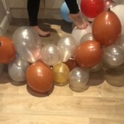 Claires sexy balloon stomping arch