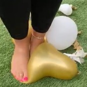 Georgous pink toes bursting balloons