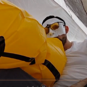 Blow a big inflatable insite a camping tent