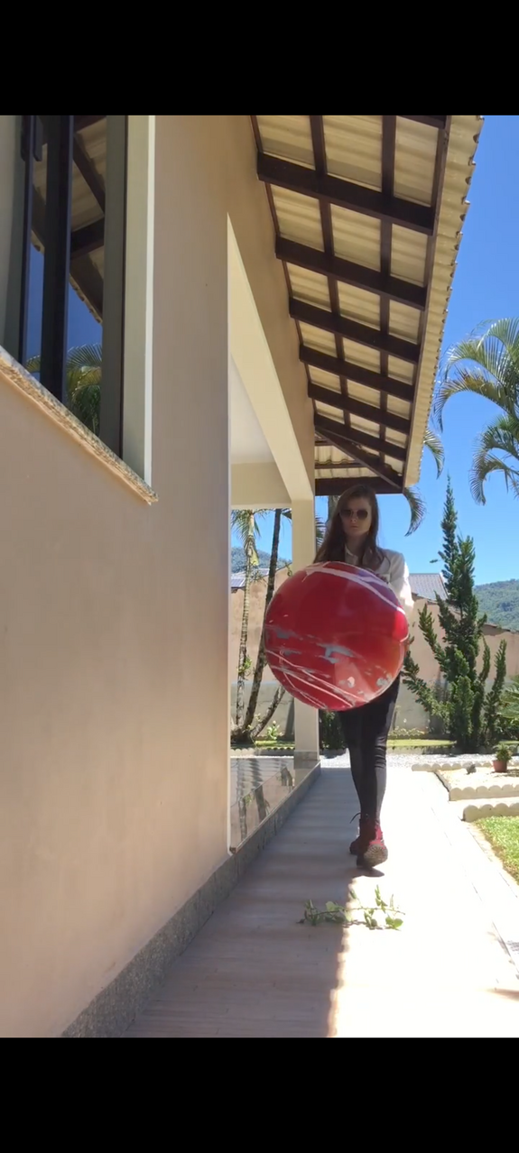 Playing with and popping colorful balls