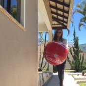 Playing with and popping colorful balls