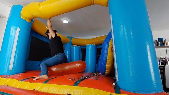 Popping balloons by nail and ride to pop in the inflatable castle!!!