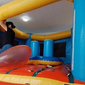 Popping balloons by nail and ride to pop in the inflatable castle!!!