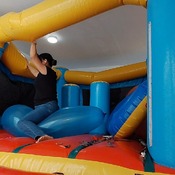 Popping balloons by nail and ride to pop in the inflatable castle!!!