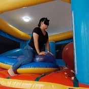 Popping balloons by nail and ride to pop in the inflatable castle!!!