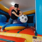 Popping balloons by nail and ride to pop in the inflatable castle!!!