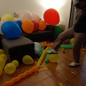 Popping lots of balloons by Julie!!!