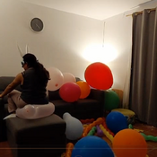Popping lots of balloons by Julie!!!