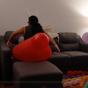 Popping lots of balloons by Julie!!!